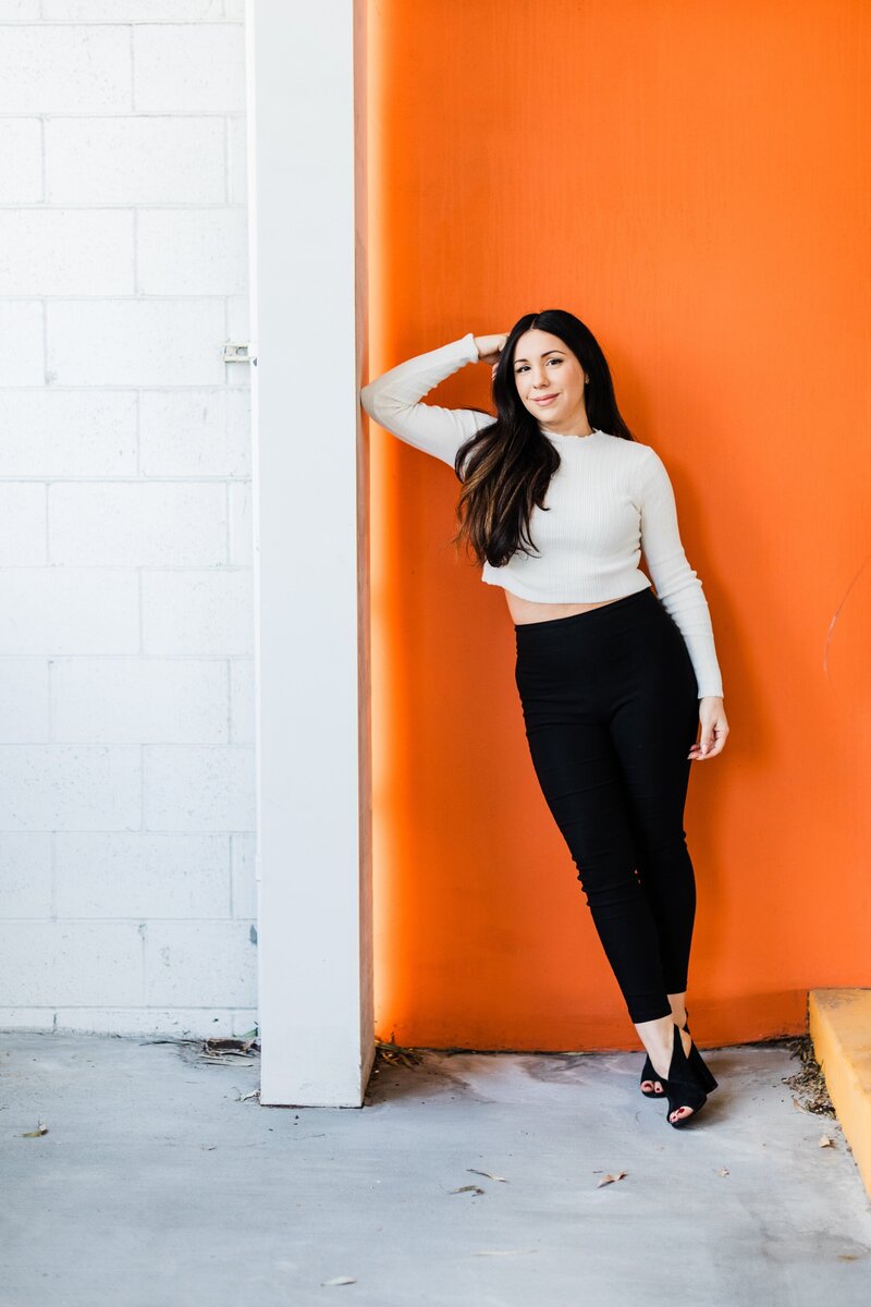 los-angeles-branding-photo-in-front-of-orange-wall