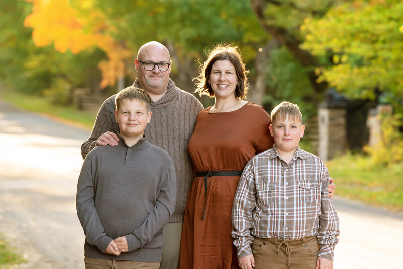 Mom and dad with their two boys for their fall family photos in Burlington, ON.