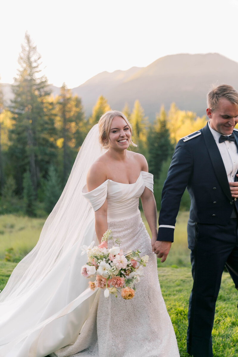 bride and groom smiling