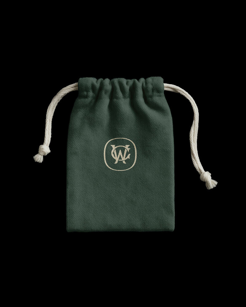 Pouch packaging with monogram for luxury dog treat brand.