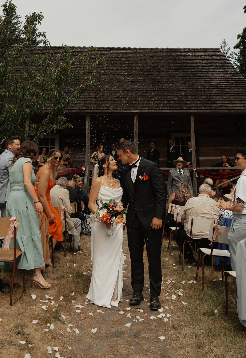 Bride and Groom exchanging vows on their Kingfisher boat on Vancouver Island