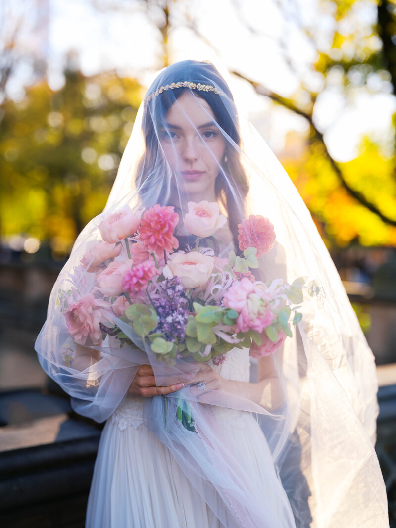 Bride and groom holding hands at Lafayette Park  outside by Colorado wedding Photographer JKG Photography