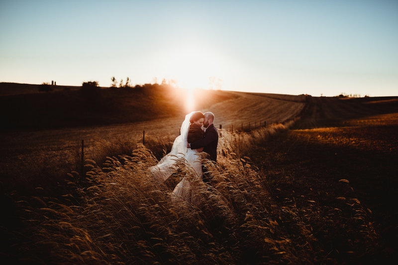 Bride and Groom together during sunset at their Blue Mounds Wisconsin Wedding