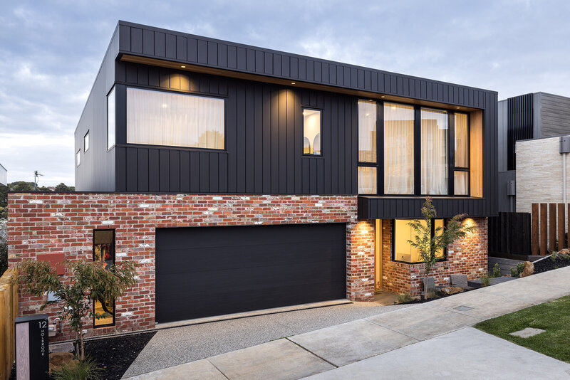 Red brick and colourbond house modern home design