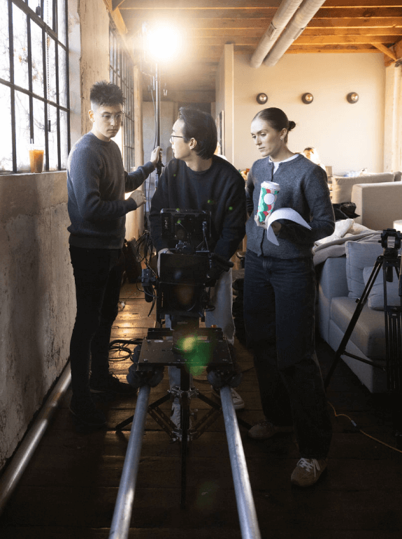 The Studio Chicago team behind the camera in their studio space.