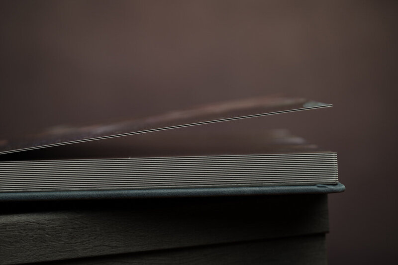 Thick, layflat pages of a modern wedding album, designed for seamless photo display and longevity.