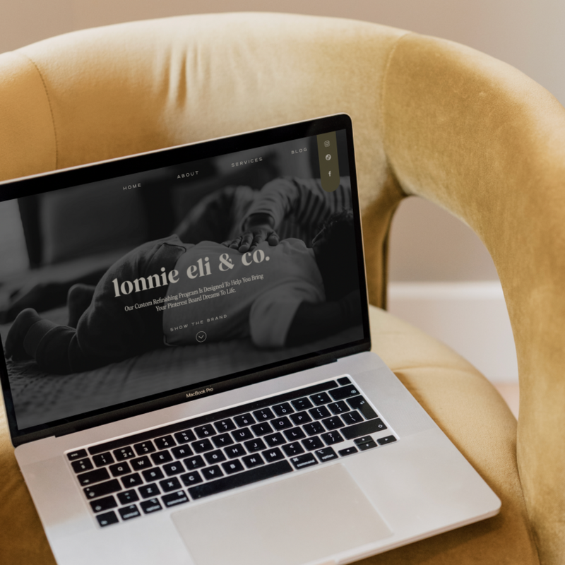 Showit website design on laptop showing mobile responsive layout for female entrepreneur business