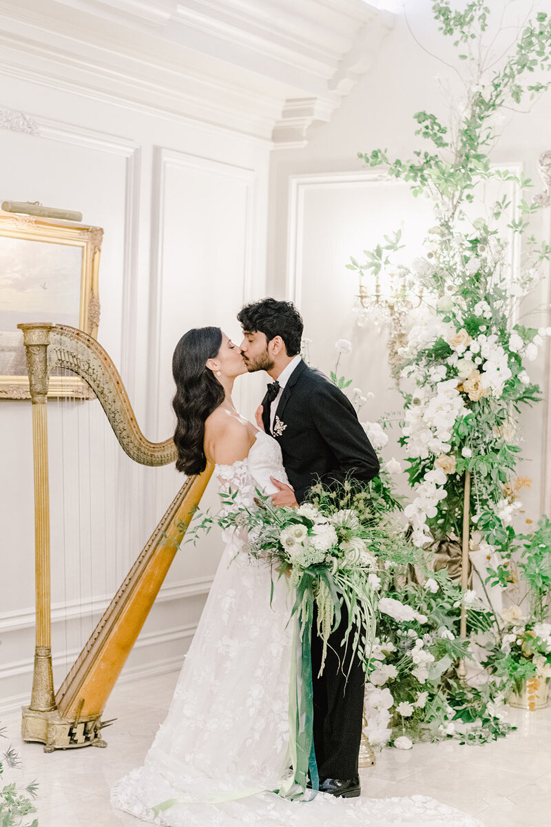 bride and groom kissing