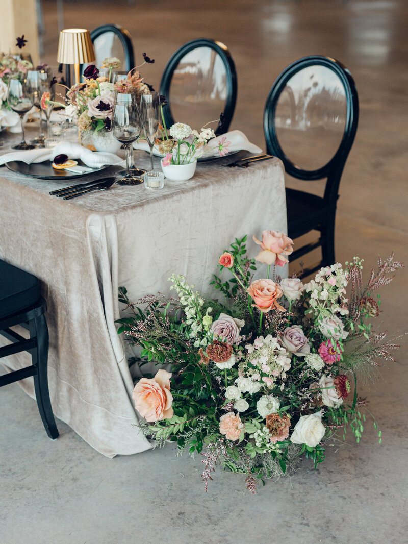wedding reception head table with florals, taken by wedding photographers in baltimore Nicole Simensky