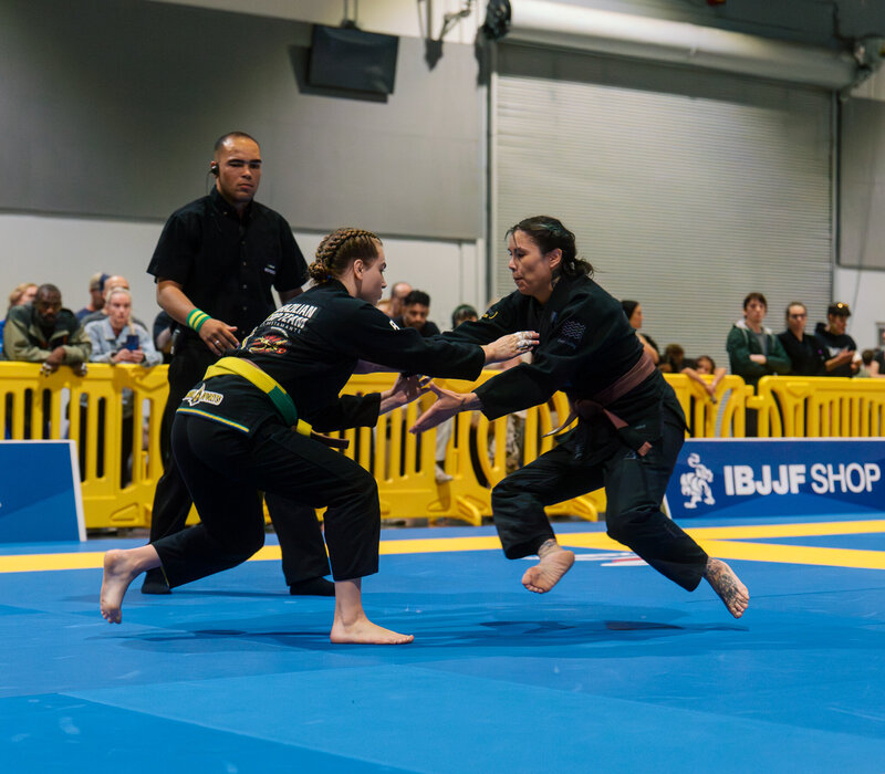 Two female brown belts grappling in the PNW at IBJJF