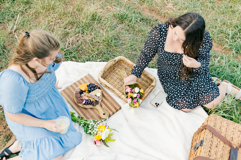 Detail shot of charcuterie and flowers at Five Heart Farms