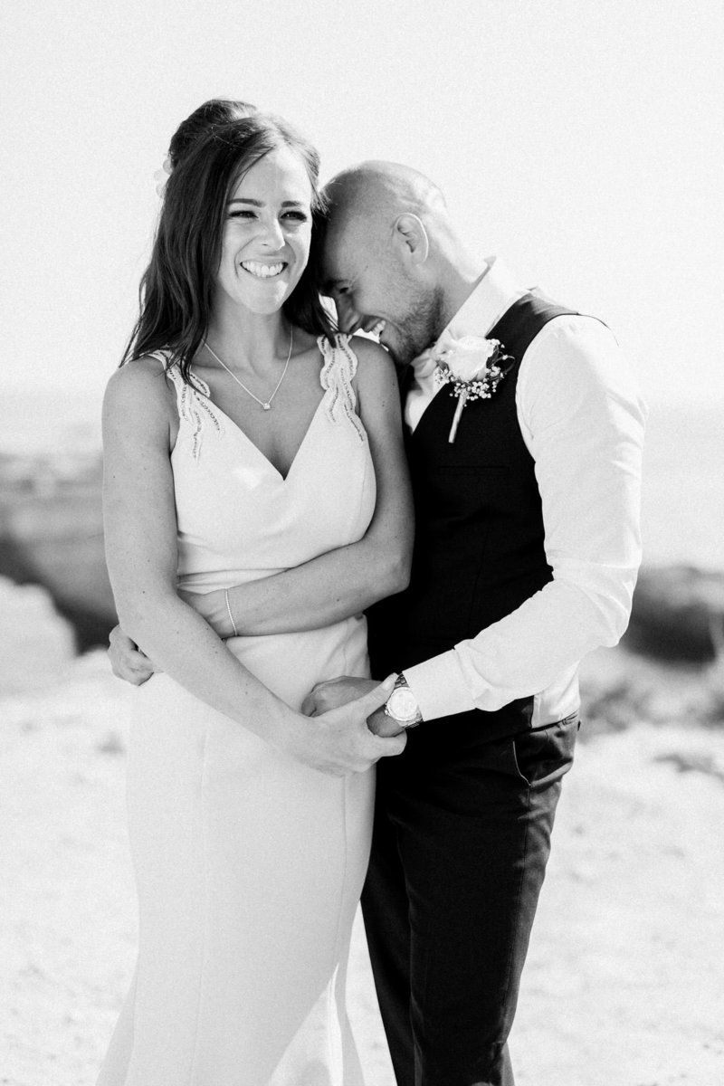 stunning bride and groom married on the cliffs in algarve, portugal