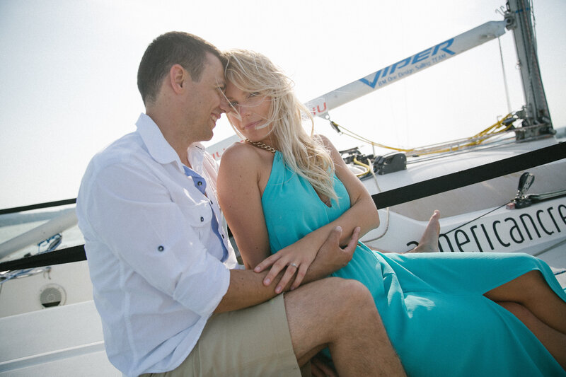 Engagement session by the sea with couple embracing – intimate destination photography in Capri, Italy