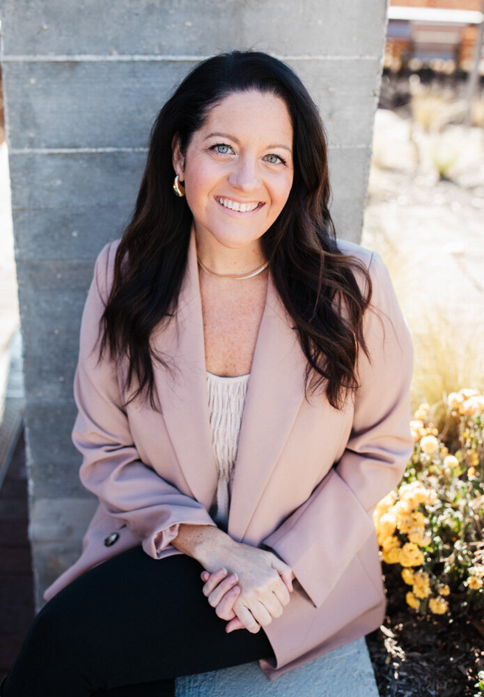 alison seponara in a pink jacket smiling