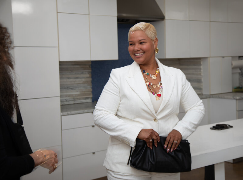 LAU member beaming during an NYC networking event.