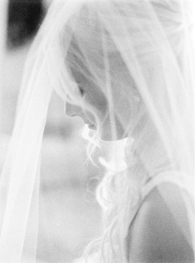 11_012-fine-art-wedding-portrait-of-the-bride-shot-on-black-and-white-film-761x1024