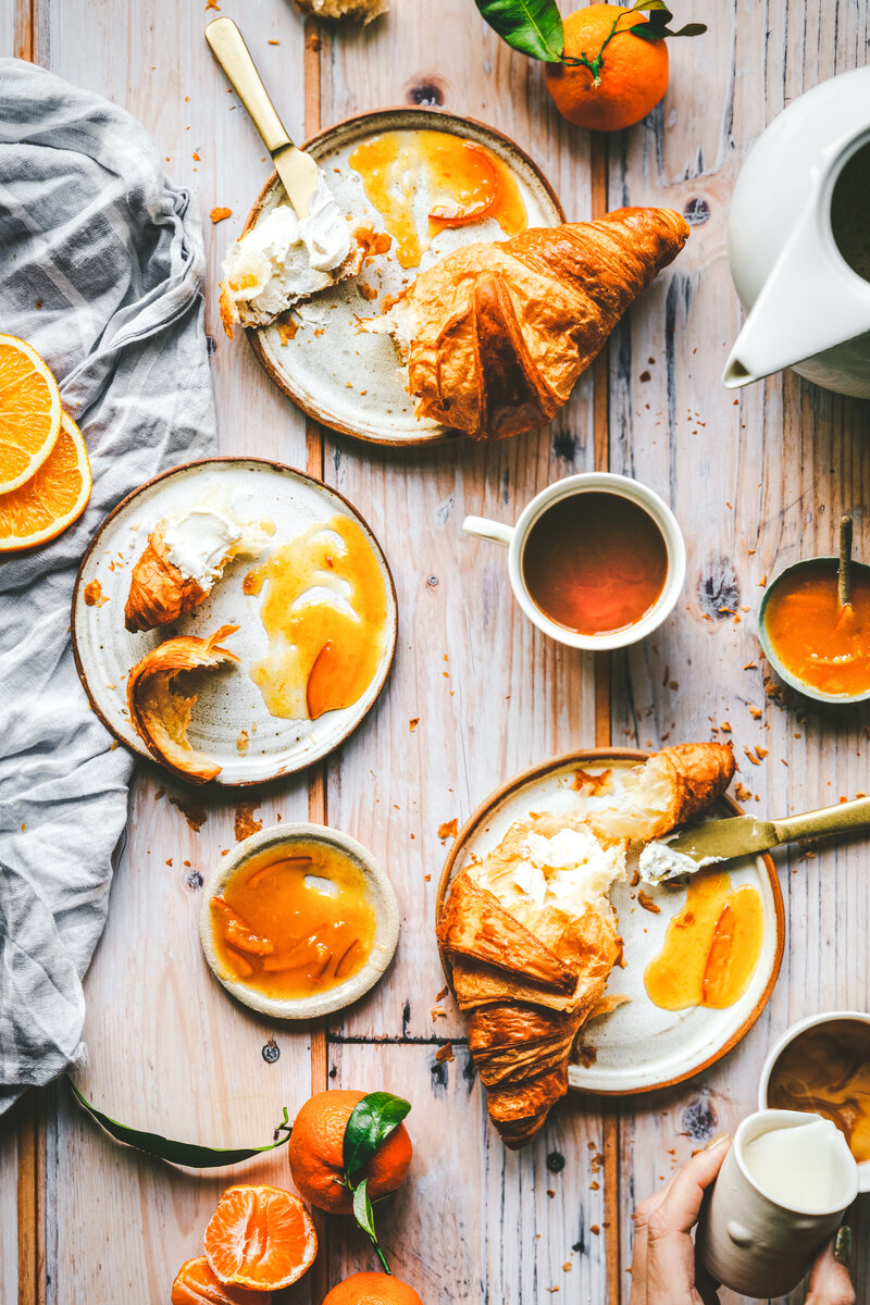 Alicja sieronski Food Photographer - bright breakfast table with croissant and marmaladeJPG