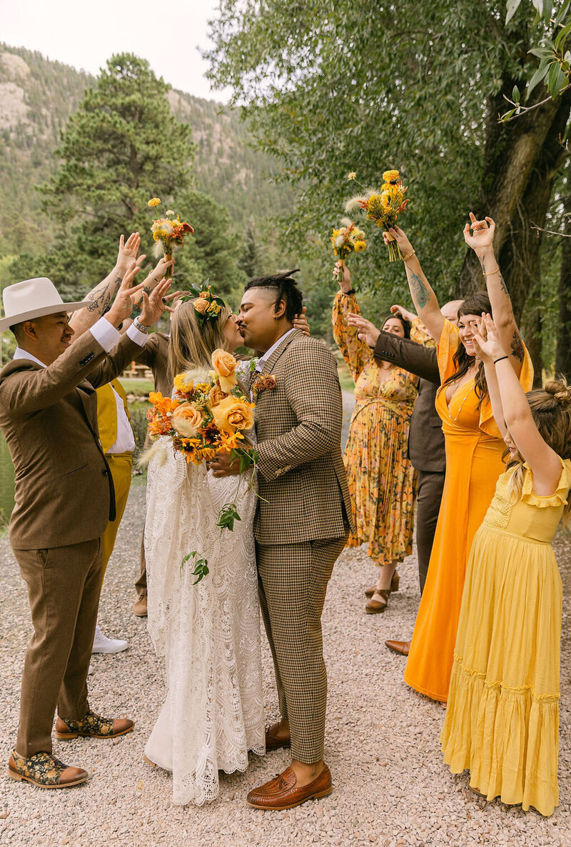 colorful, joyful wedding party photos in Estes Park, Colorado at Venue On The Rocks