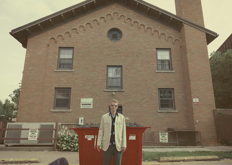 We did a few different sets including his music love, and his shades and mix-match birkenstock spirit... but then...  We did the dumpster. Harpers Bazzar and Wes Anderson Style.