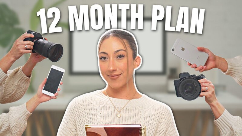 Millie grinning with 12 month plan written above
