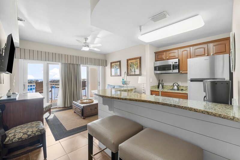brown barstools at granite countertop