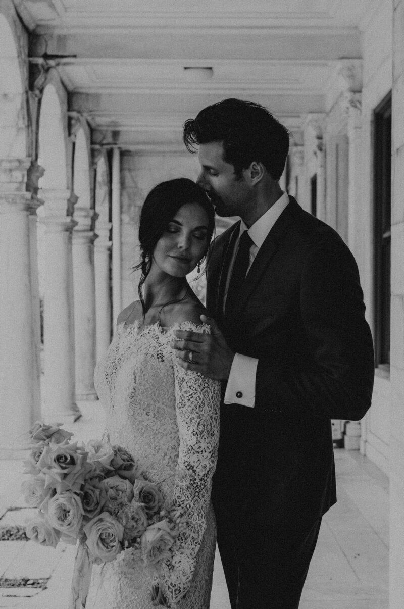 Black and white, timeless photography portrait of wedding couple.