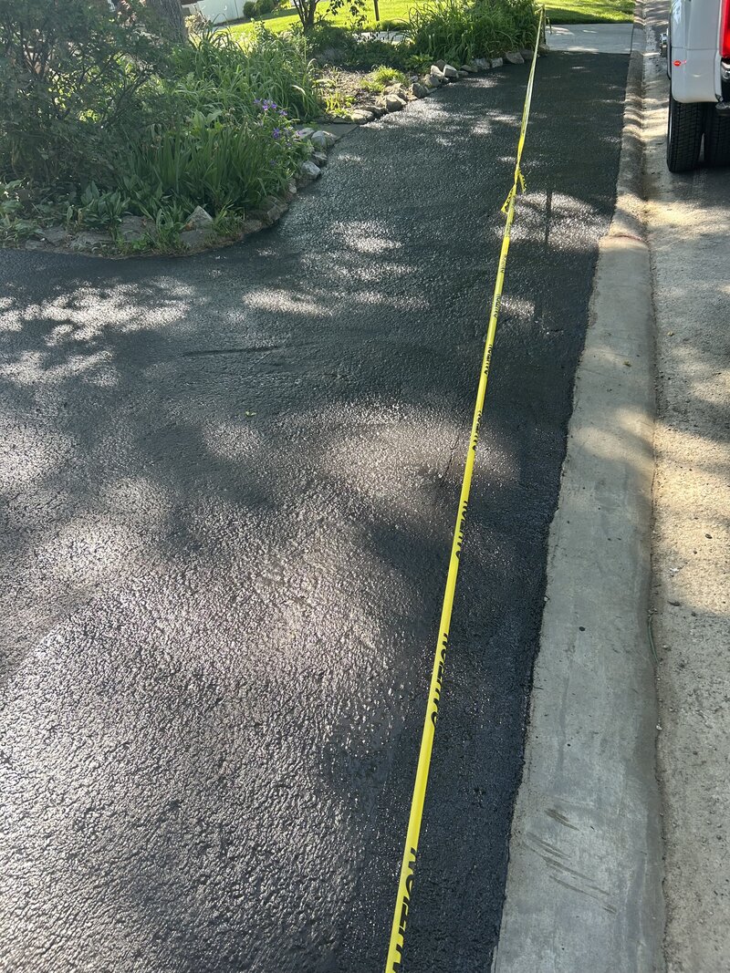 Driveway recently sealcoated
