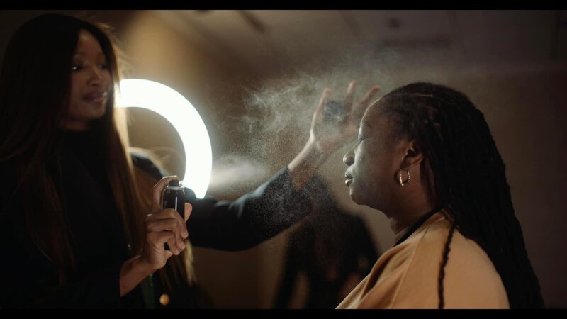 Mindy getting makeup done at photography conference