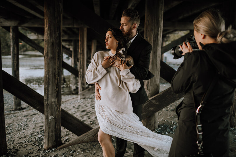 man hugging woman from behind