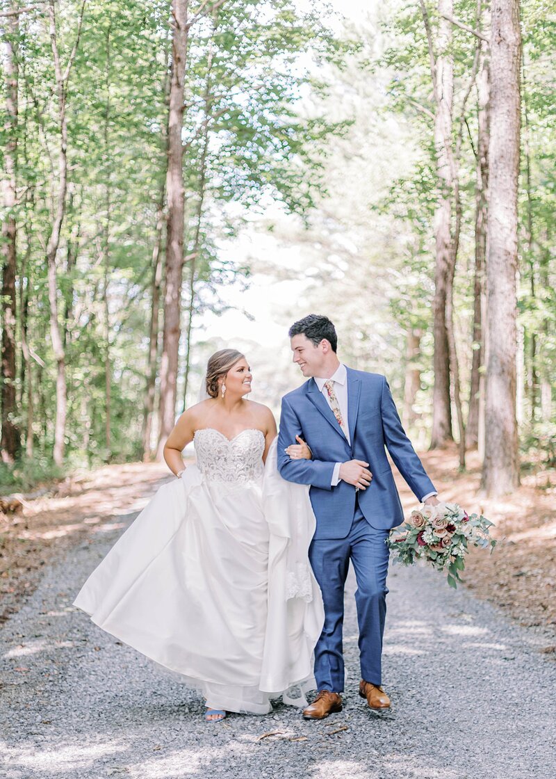 Bride and groom walk up memorial steps at their DC wedding
