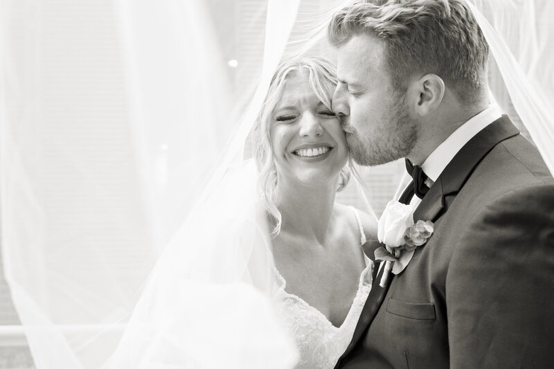 Wedding couple under the veil at Jan Serr Studio in Milwaukee