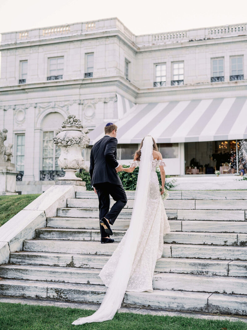 A wedding ceremony exit outside at Rosecliff Mansion in Rhode Island