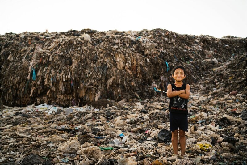 boy in dump in thailand