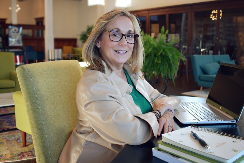 Diana Duggan Quickbooks Pro Advisor at desk