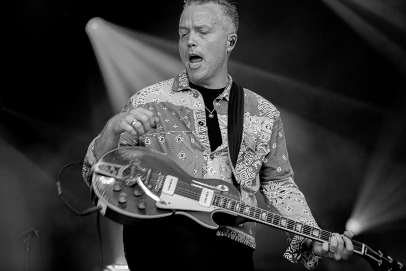 North Carolina photographer Light Shifter Studios photographs at a  outdoor venue of a Jason Isbell concert.