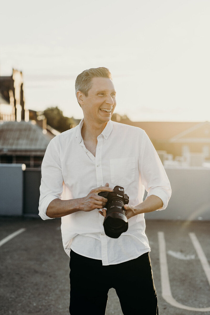 Hunter Valley and Central Coast Wedding photographer Chris Perkins. The owner of underatreehouse Photography. Photo of him smiling towards the camera