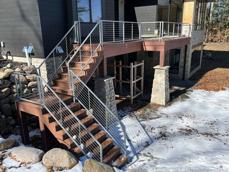 Custom metal railing installed in Northern Michigan home by Ace Welding