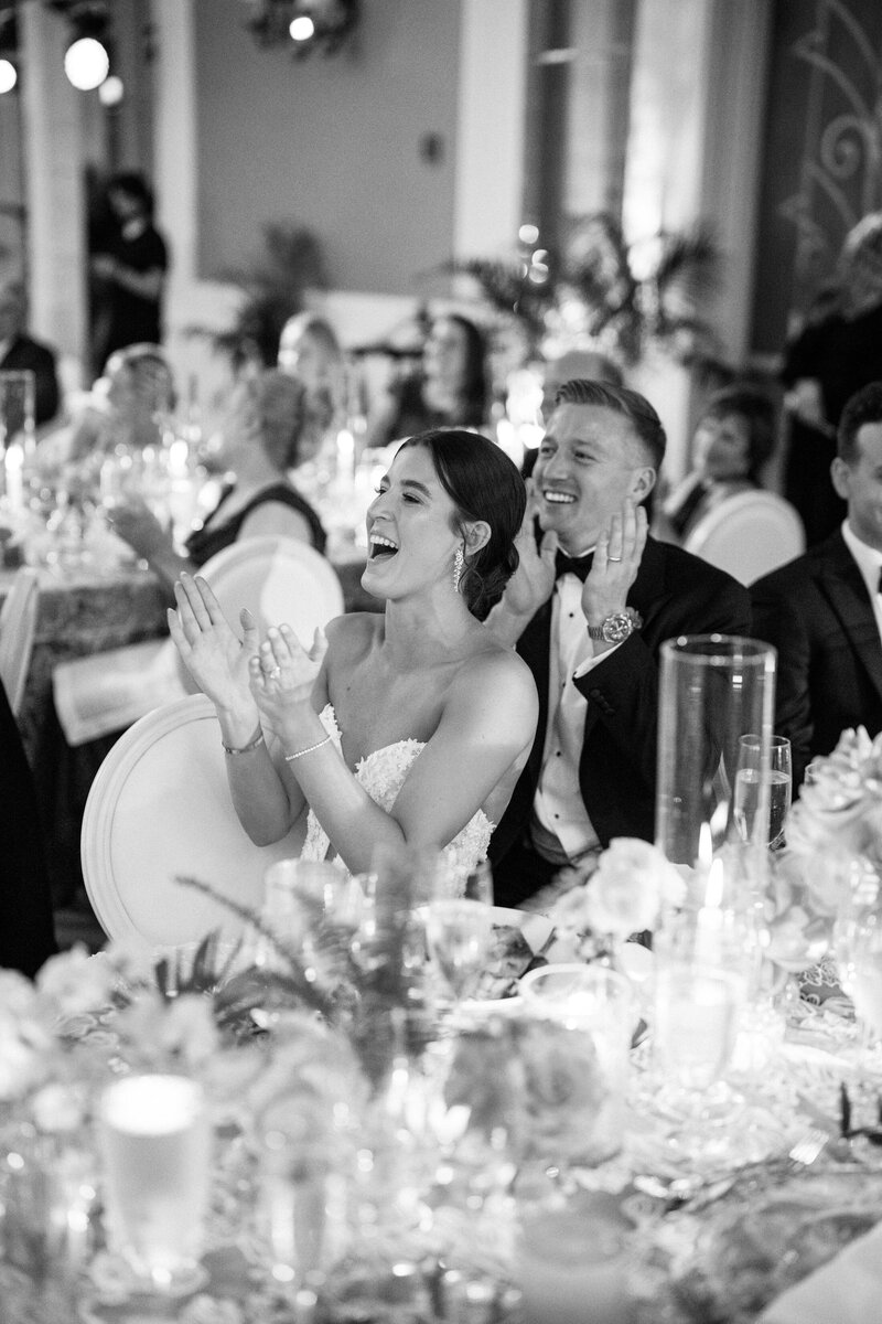 Black and white image of a bride and groom first dance