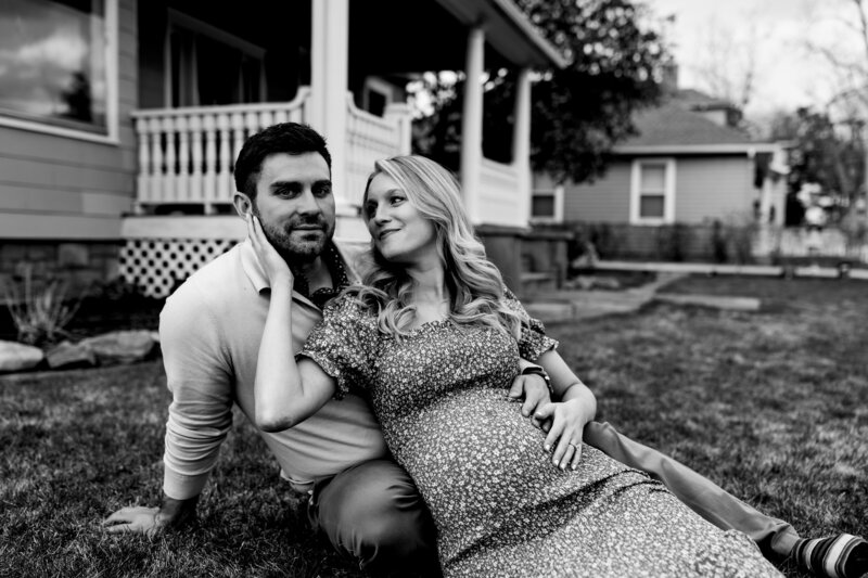 Black and white photo of a couple awaiting the arrival of their baby.