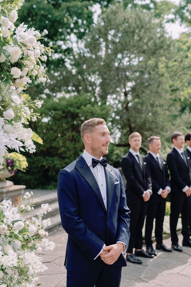 Grooms Sees Bride at Ceremony at Graydon Hall Manor Toronto Jacqueline James Photography