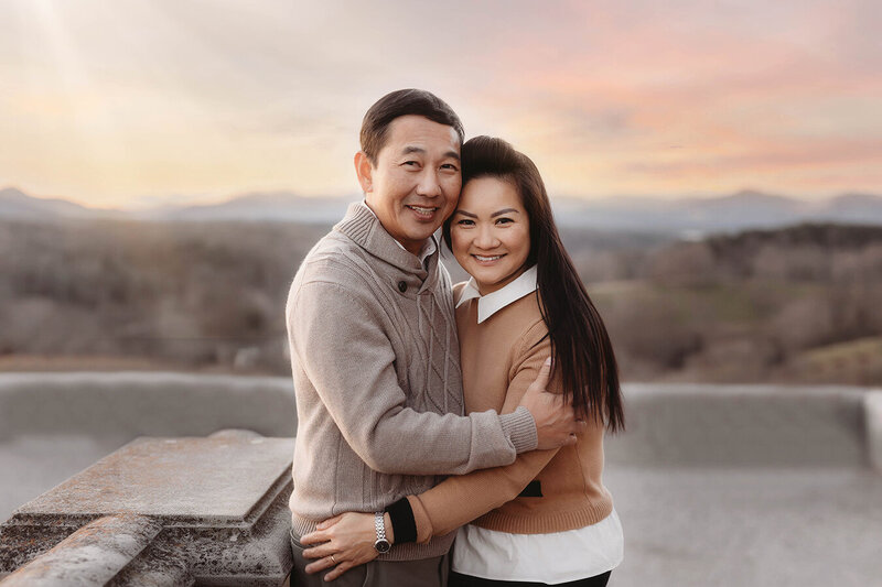 Sisters embrace during Fall Family Photos in Asheville, NC.