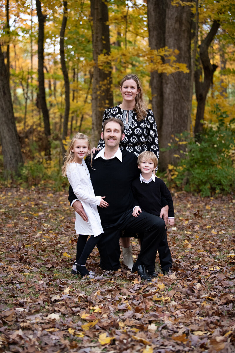 Family portrait on wooded trail