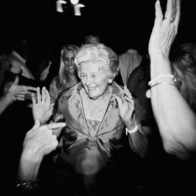 Older woman enjoying wedding reception at wedding in Halifax Nova Scotia