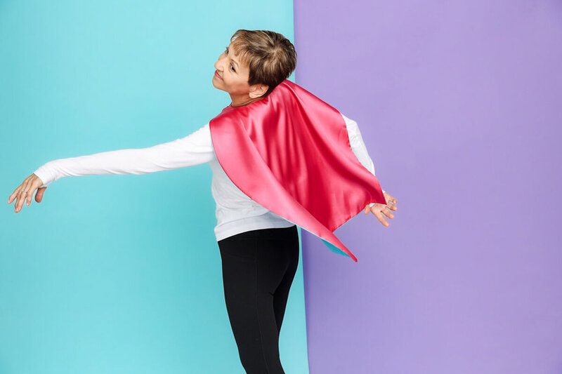 Melinda Fornero in a superhero cape