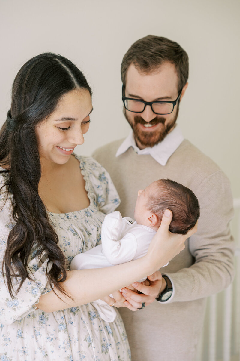 Natural, joy-filled family newborn session with real connection and warmth