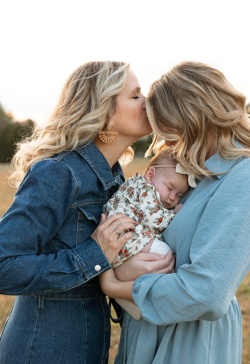 Three generations portrait taken at extended family session in De Soto, Missouri. 