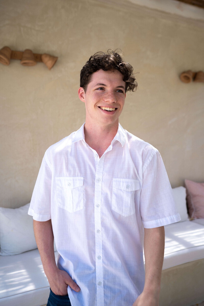 A smiling teen, showing the impact of self-confidence and guidance from the Teen WAVE coaching journey.