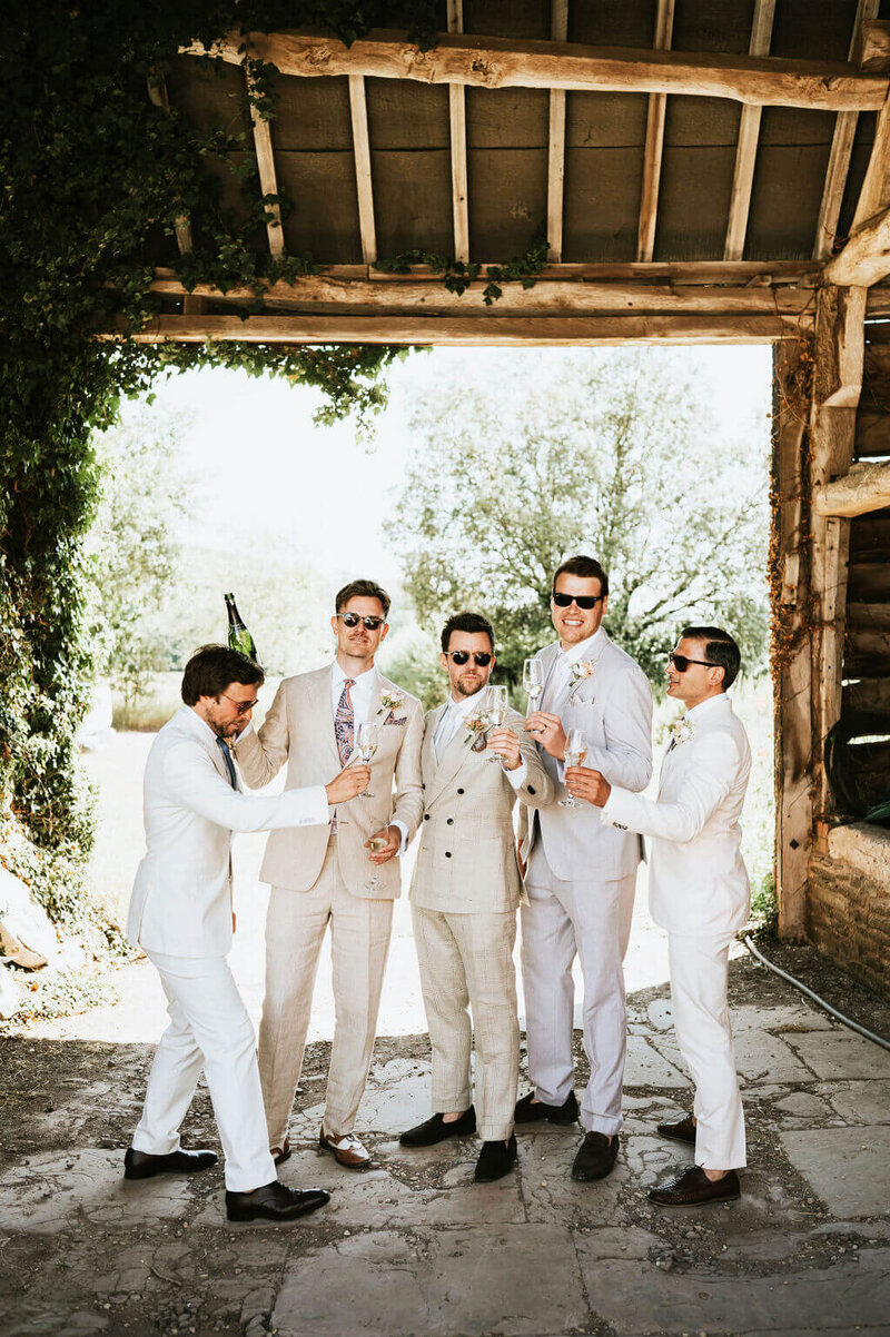 Groom's party with a buttonholes at Broadfield Court