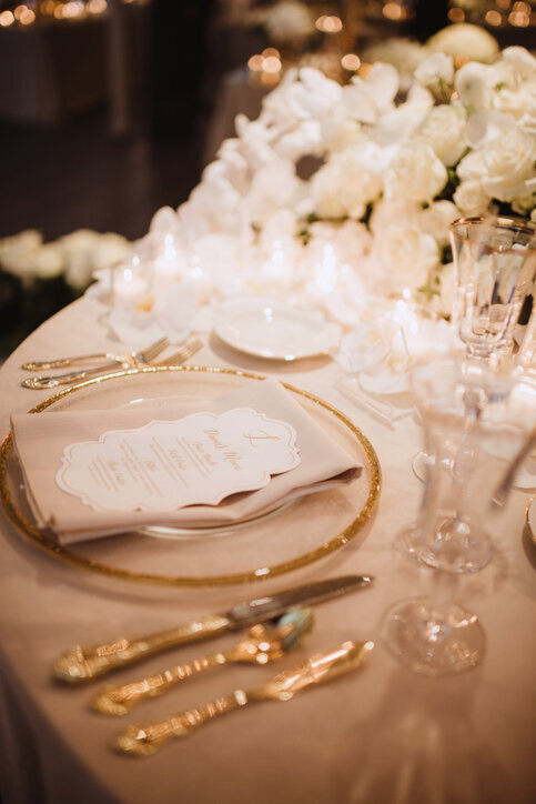 gold and white table setting