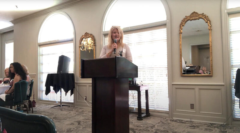 Dr. Jada Davis introducing Christian author and speaker Nita Tin at the 2023 Scenic City Women’s Network event in Chattanooga, Tennessee.